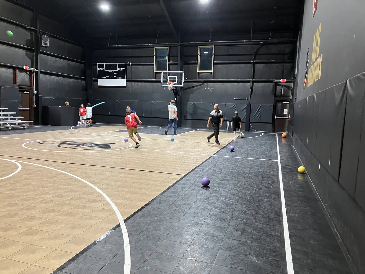 Students playing basketball in the gym