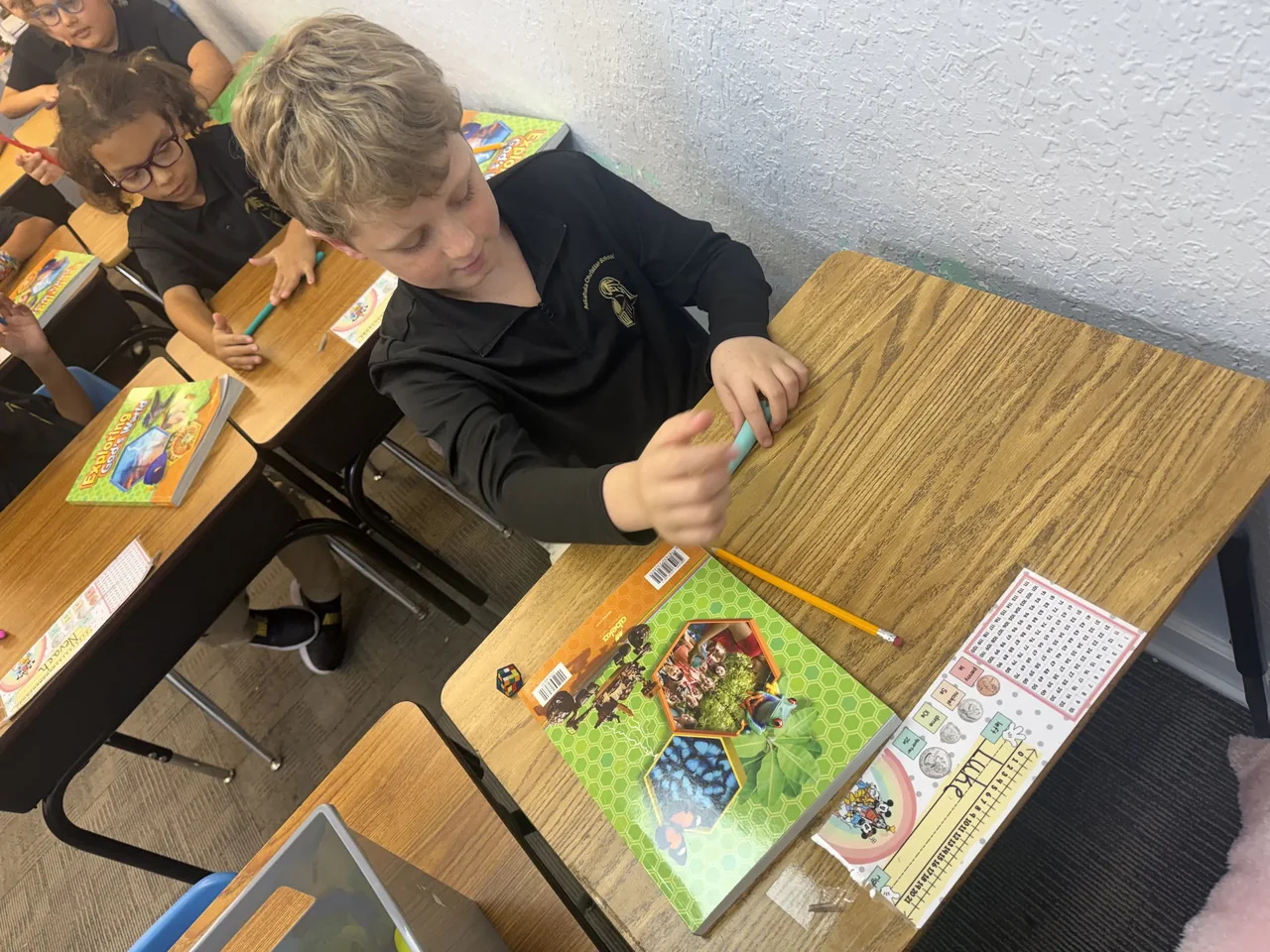 Student completing a classroom activity