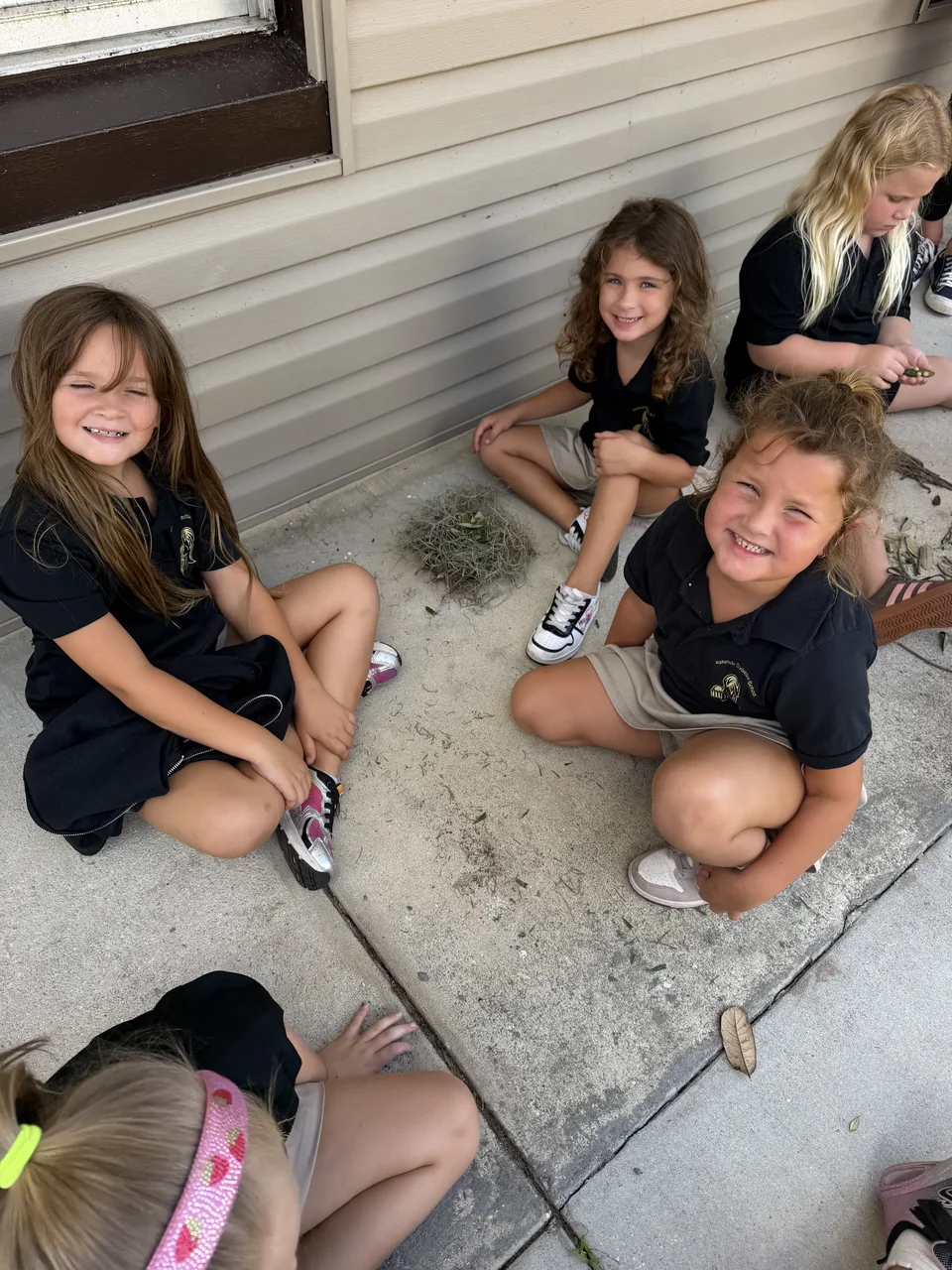Students sitting outside together